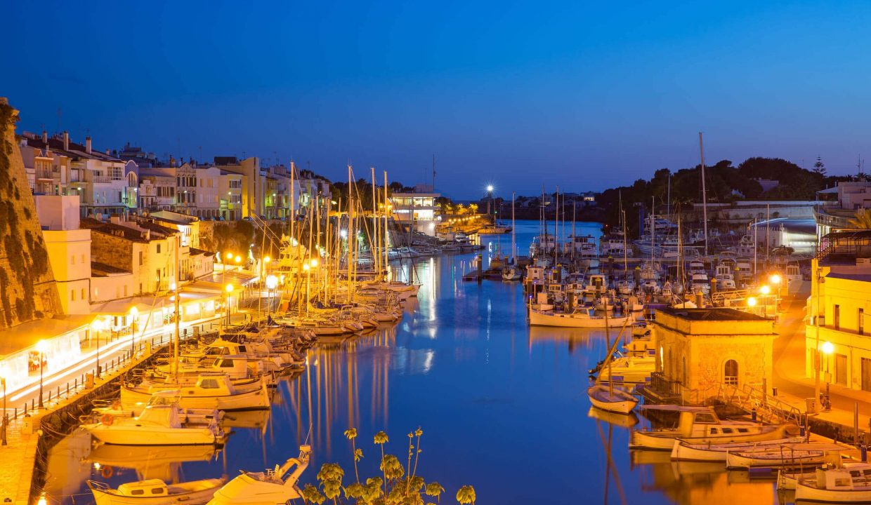 ciutadella menorca port sunset town hall and cathedral in balearic islands