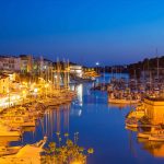 ciutadella menorca port sunset town hall and cathedral in balearic islands